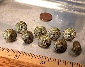 Set of 9 vintage gold tone metal buttons with metal shank. Mid Century fashion.