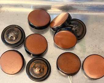 Set of 10 vintage early brown and black, flat plastic buttons with a metal shank.