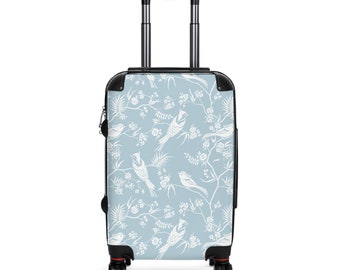 Maleta de fin de semana con ruedas giratorias y asa ajustable. Diseño versátil de pájaro azul claro con estilo bohemio.