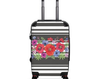 Maleta de fin de semana con ruedas giratorias y asa ajustable, diseño floral y de rayas de colores.