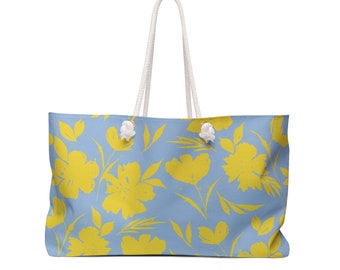 Sacola grande para fim de semana com alças de corda e design floral amarelo e azul claro