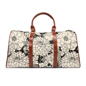 Waterproof Travel Bag Black and White Floral Design Brown Faux Leather Handles Shoulder Strap