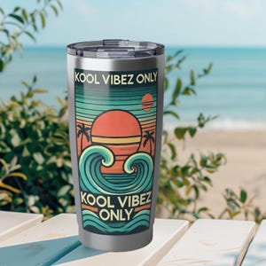 May include: A stainless steel tumbler with a colourful graphic design featuring a sunset, waves, and palm trees. The text "Kool Vibez Only" is printed on the tumbler.