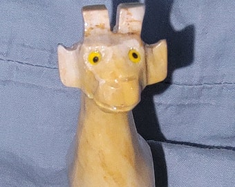 Giraffe hand carved of Peruvian Dolomite. Yellow and white