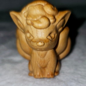 Nine tailed fox carved boxwood. Kitsune sculpture.