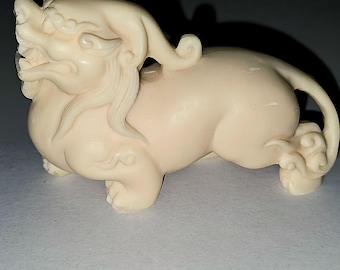 Kirin/Qilin/Dragon carved Tagua nut statue. Chimera figurine.