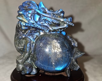 Labradorite dragon clutching spheres (pearls). Hand sculpted and one of a kind.