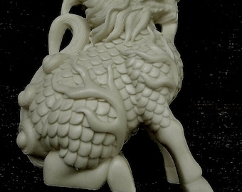 Kirin/Qilin/Dragon carved Tagua nut statue. Chimera sculpted of Ivory substitute.