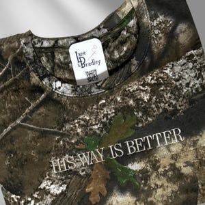 Christian Camo Hunting T-Shirt His Way Is Better Design Faith Message Apparel Bible Verse Shirt Cotton Material Church Casual Wear Multiple Size Options Short Long Sleeve Choices Embroidered Text Detail Religious Fashion Statement