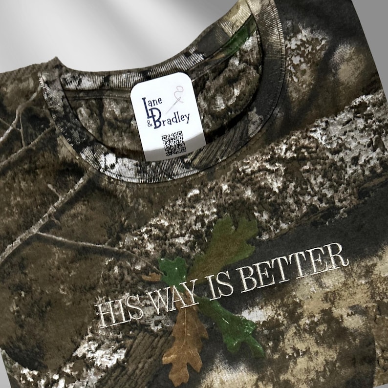 Christian Camo Hunting T-Shirt His Way Is Better Design Faith Message Apparel Bible Verse Shirt Cotton Material Church Casual Wear Multiple Size Options Short Long Sleeve Choices Embroidered Text Detail Religious Fashion Statement