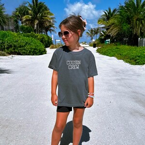 Custom Embroidered Tshirt Cousin Crew Design Family Matching Outfit Quality Cotton Construction Comfortable Youth Sizes Vacation Ready Clothing Beach Trip Essential Multiple Color Options Available Preshrunk Garment Dyed Fabric Soft Washed