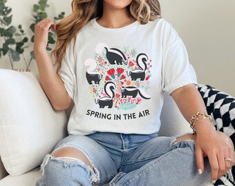 Spring In The Air Cotton Tee | Spring Skunks and Flowers Comfy T-shirt - Unisex Spring Fashion