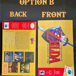 May include: The Legend of Zelda: Ocarina of Time video game box for Nintendo 64, showing the gold front cover with the title and shield graphic, and the back cover with game description text, screenshots, and Nintendo 64 branding.