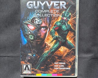 May include: The Guyver Complete Collection DVD case features a metallic title, a human face partially transformed into a bio-boosted armour, and a full-body armoured figure. Text reads: Part human. Part alien. Pure superpower. Arrow Video logo.