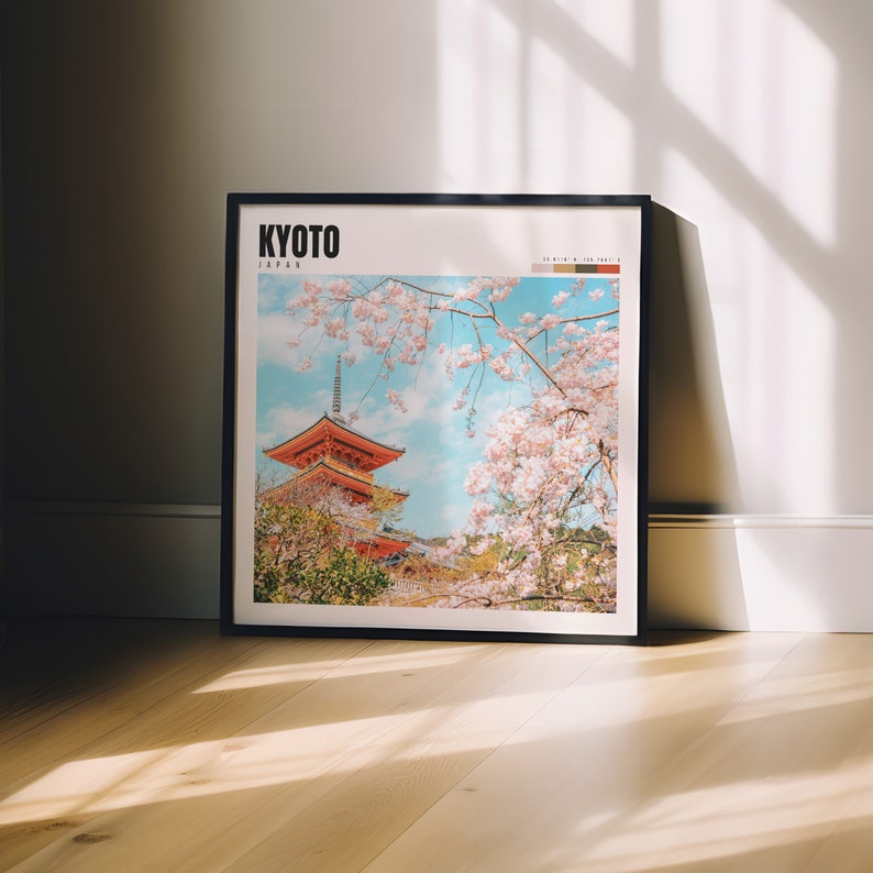 a picture of a cherry blossom tree with a pagoda in the background