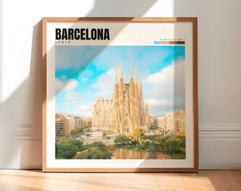 May include: A framed print with a photo of the Sagrada Familia basilica in Barcelona, Spain. The print has the text "BARCELONA" and "SPAIN" in black text at the top. The print also includes the coordinates "41.3874° N, 2.1699° E" in small text.