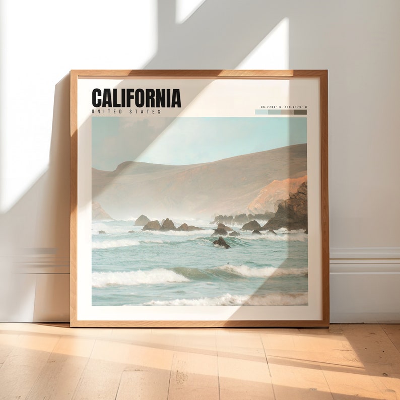 a picture frame sitting on the floor in front of a wall