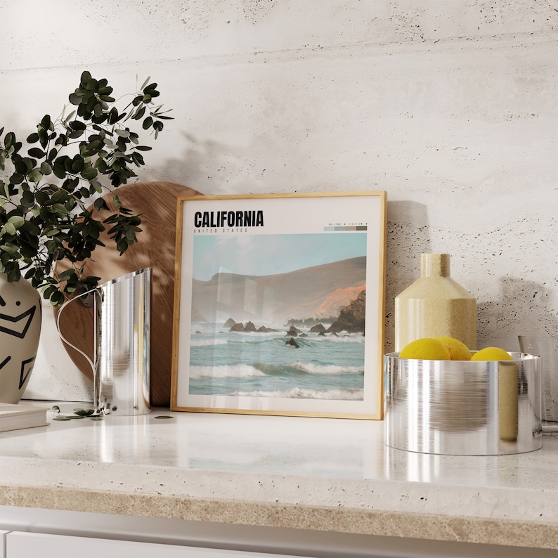 a picture of a picture of a beach and a vase of flowers