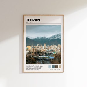 May include: A minimalist poster with the text "TEHRAN" in bold black letters and "IRAN" in smaller black letters. The poster features a photograph of the city of Tehran, Iran, with snow-capped mountains in the background. The poster also includes a color palette with six different shades of blue, gray, and brown.