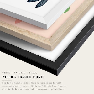 a close up of a picture frame with a bird on it