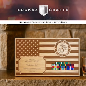May include: Wooden plaque featuring an American flag design with the United States Marine Corps emblem. The plaque includes the name "MICHAEL J. JONES", rank, and service details. A collection of colorful ribbons is displayed below the emblem.