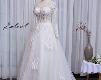 Custom wedding dress with elegant A-line shape, meticulously embroidered, white wedding dress.