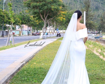 Luxurious long ivory bridal veil. Wedding veil embellished with sparkling pearls. Beautiful 1-tier bridal veil. Custom bridal veils.