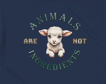 May include: A navy blue t-shirt with a white lamb illustration and the text "Animals are not ingredients" in a green circle.
