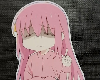 May include: A pink anime character with long pink hair and a pink and white outfit is sitting with a finger pointed up. The character has a tired expression.