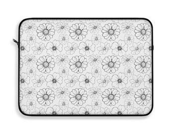 Chic laptop sleeve with elegant floral pattern. Keep your device safe and stylish.