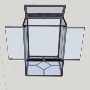 May include: A clear glass terrarium with a black metal frame. The top of the terrarium is open and the sides are hinged and open. The terrarium has a black metal base with a grid pattern.