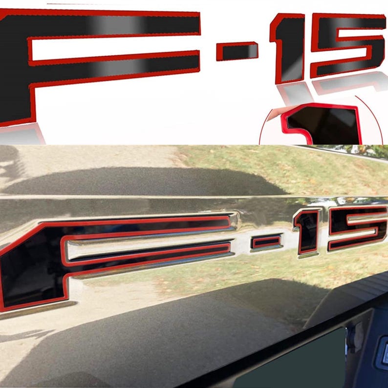 Puede incluir: Juego de emblemas F-15 negros y rojos. Las letras y los n&uacute;meros son negros con un contorno rojo. El emblema se muestra en m&uacute;ltiples vistas, incluida una vista instalada en un veh&iacute;culo.