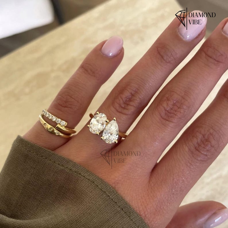 Small Hand File Set Toi Et Moi Engagement Ring Oval and Pear Cut Diamond Ring Two Stone ...