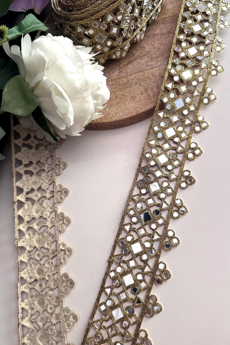 Handcrafted Indian mirror lace trim roll in gold, perfect for DIY festival outfits, waist belts, and dance costume embellishments.