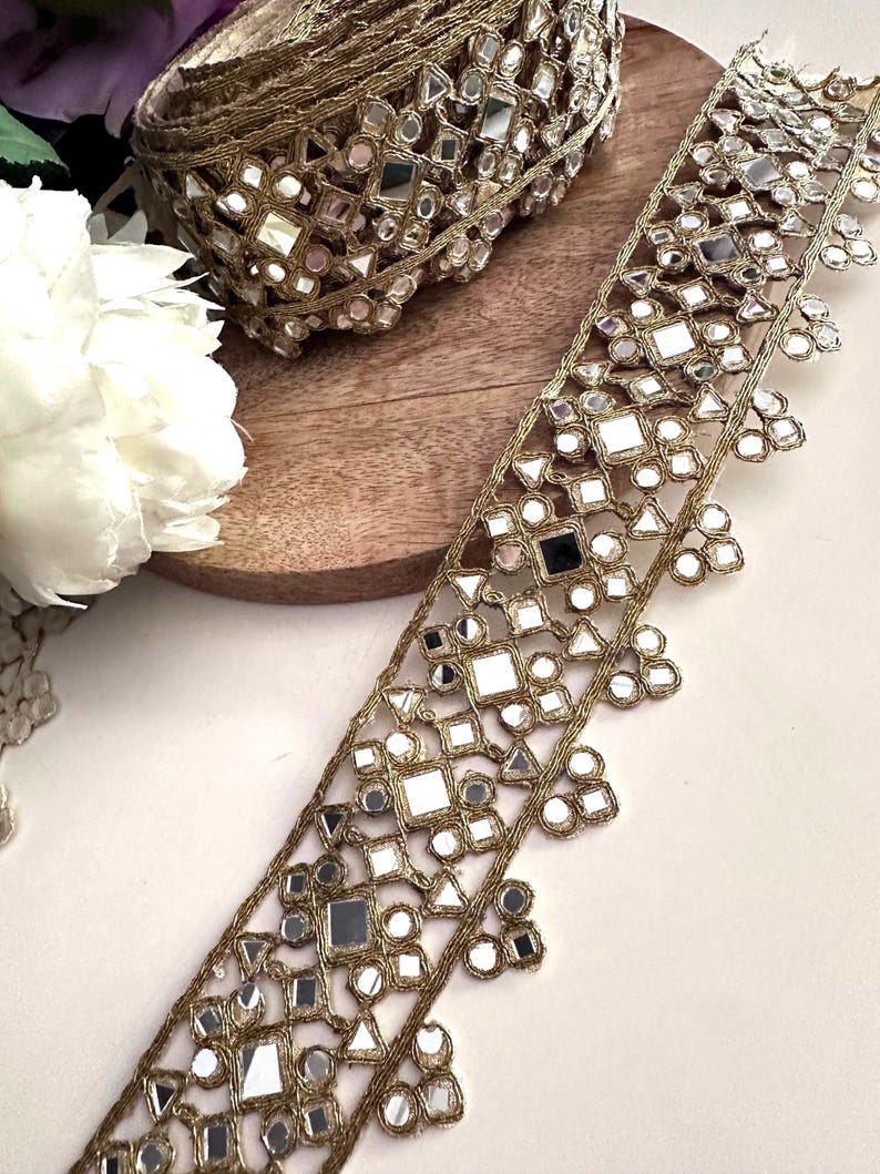 2.5-inch wide golden mirror lace with triangle, square, and circular mirrors, designed for couture belts, gowns, and DIY accessories.