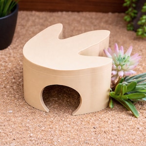 May include: A handmade wooden sign with the text "Welcome" in a playful font. The sign features a distressed white background and a dark brown border, perfect for a front door or entryway. Measures approximately 12 inches wide.