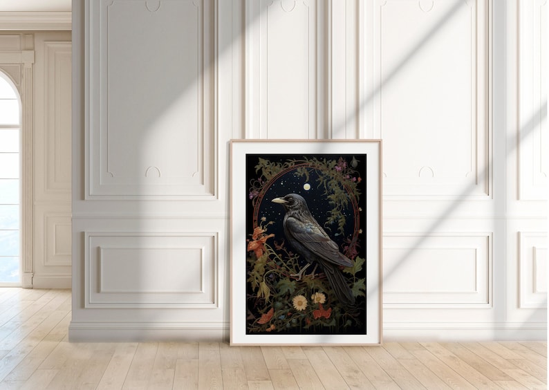 May include: A framed print of a black crow perched on a branch with flowers and leaves. The background is a dark blue with stars and a moon.