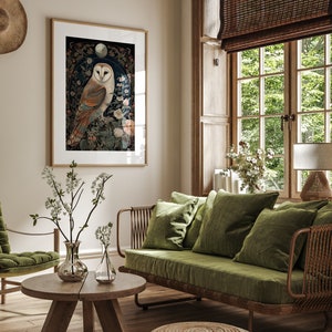 May include: A framed art print featuring a detailed illustration of a barn owl. The owl is depicted with white, brown, and orange feathers, perched amidst floral elements. The artwork is set against a dark background with a moon and floral accents, creating a vintage aesthetic.