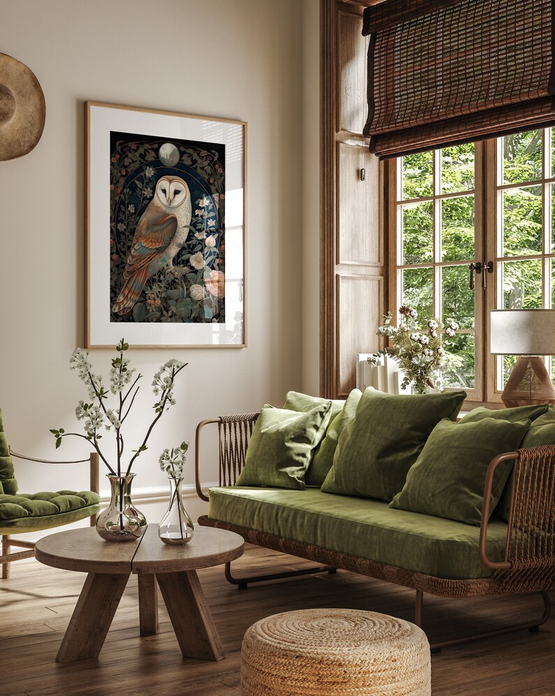 May include: A framed art print featuring a detailed illustration of a barn owl. The owl is depicted with white, brown, and orange feathers, perched amidst floral elements. The artwork is set against a dark background with a moon and floral accents, creating a vintage aesthetic.