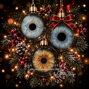 May include: Three clear glass Christmas baubles featuring detailed human eye irises inside, two blue and one brown, nestled in a wreath of green pine branches, red berries, and gold accents with the text Eye Iris Overlay JPG PNG PSD by Winwin Design.