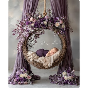 May include: A newborn baby sleeps peacefully in a woven nest swing, adorned with purple and white flowers. The swing is suspended from a rope, with draped purple fabric and floral arrangements on either side. The text "Winnie Design Art" is visible.