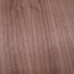 May include: A close-up of a smooth, light brown wood surface with a natural wood grain pattern.