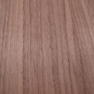 May include: Close-up of a light brown wood grain surface. The wood has a natural, smooth finish.