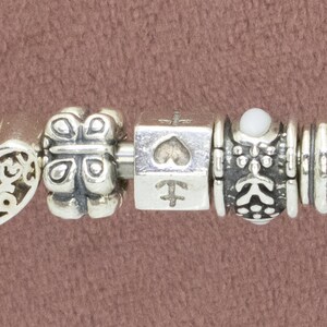 Pandora charms (14 pieces) in 925 silver: Personalize cheaply