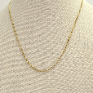 Gold-colored gourmet necklace – elegant and timeless
