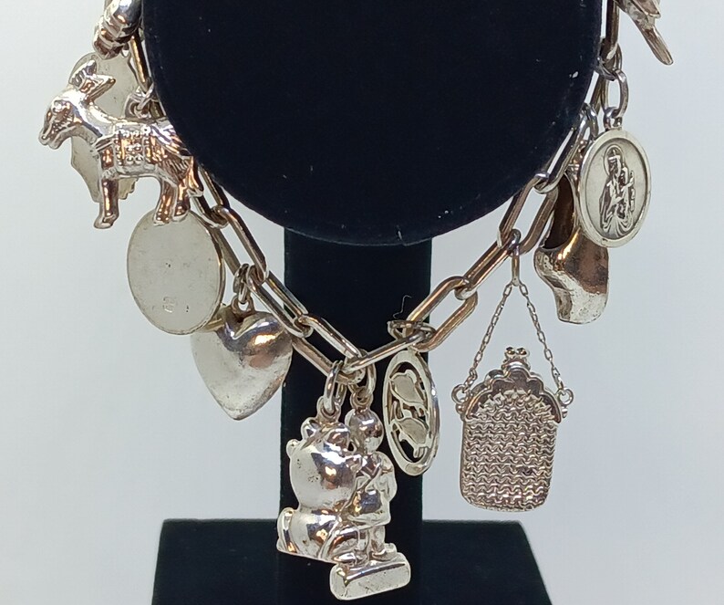 Unique Charm Bracelets Personal Symbolism in Sterling Silver Etsy