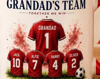 May include: White ceramic mug with a red interior and handle, featuring a soccer-themed design. The mug displays the text "GRANDAD'S TEAM" and "Football, family, forever." with personalized jersey graphics.