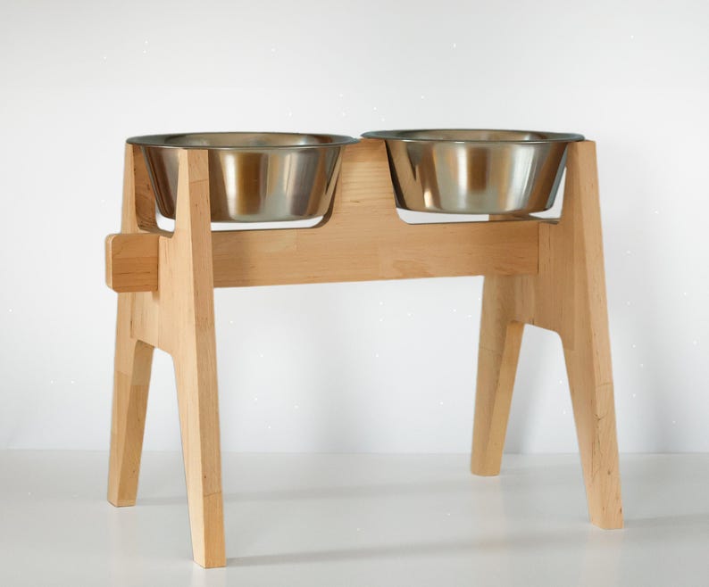 Customizable dog bowl stand, elevated pet feeder, beech wood large dog feeding station. Handmade wooden pet bowl holder with rustic design. Elevated dog food stand, personalized and unique pet dining stand. Perfect for a customized pet bowl setup.