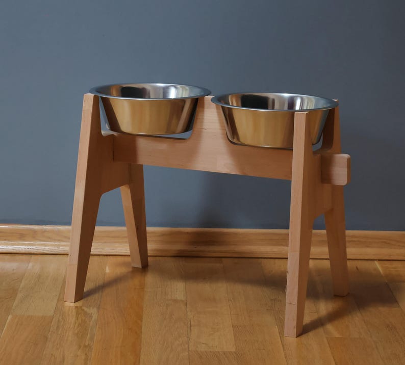 Customizable dog bowl stand, elevated pet feeder, beech wood large dog feeding station. Handmade wooden pet bowl holder with rustic design. Elevated dog food stand, personalized and unique pet dining stand. Perfect for a customized pet bowl setup.