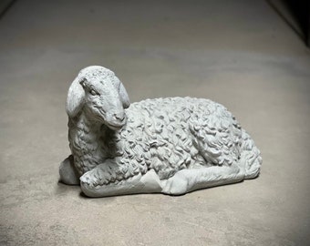 Laying lamb with ears down statue Resting sheep figurine Detailed lamb sculpture